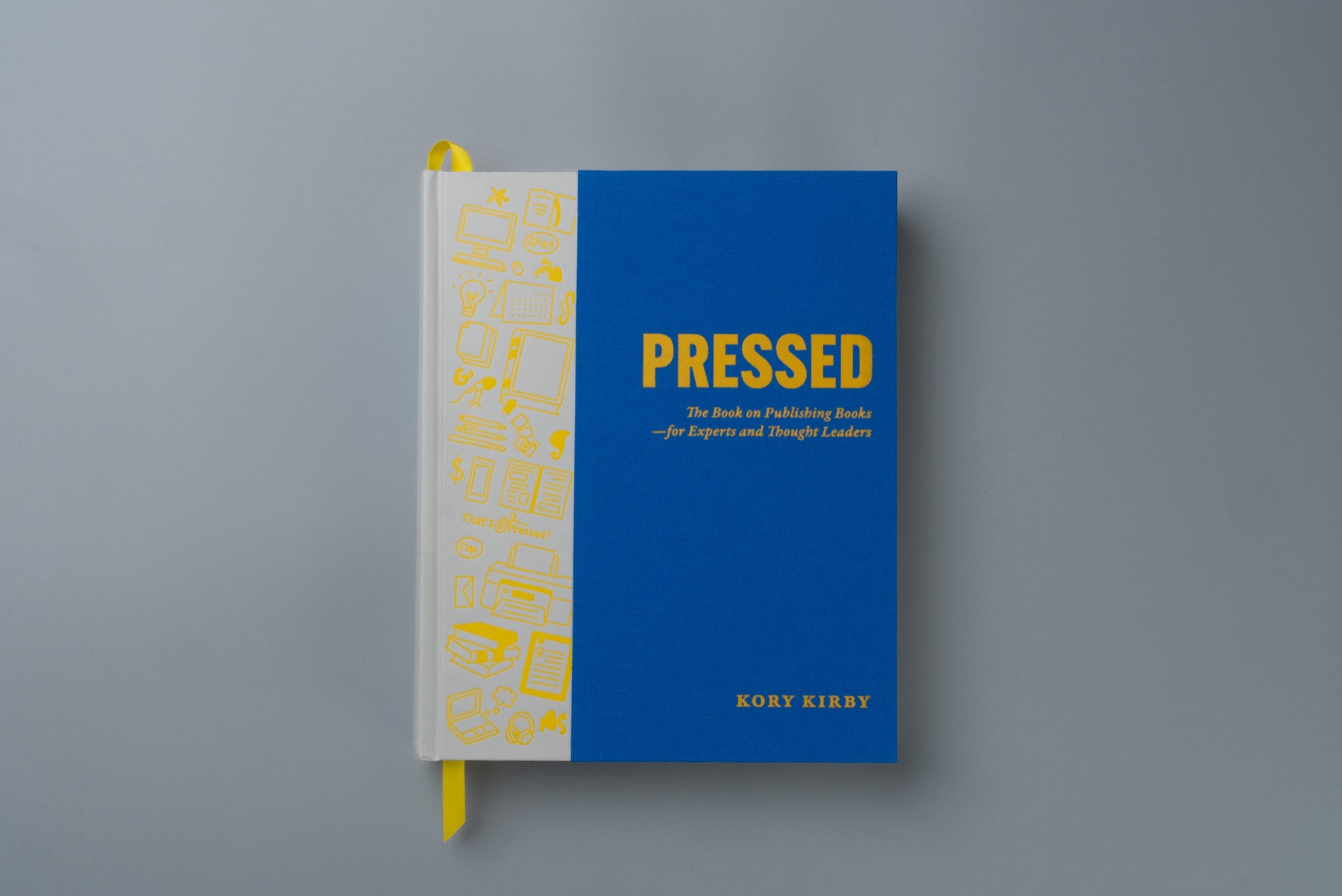 The Pressed hardcover standing upright, front cover facing out