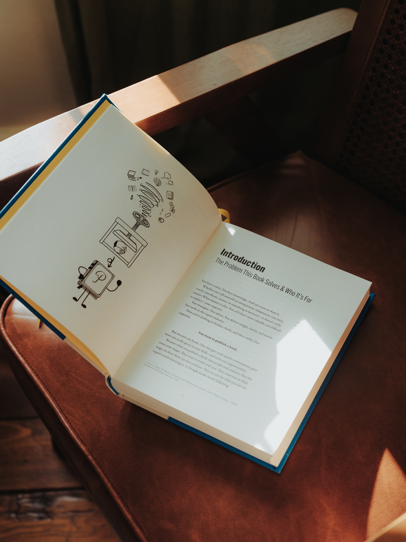 Pressed open to the Introduction on a wooden chair
